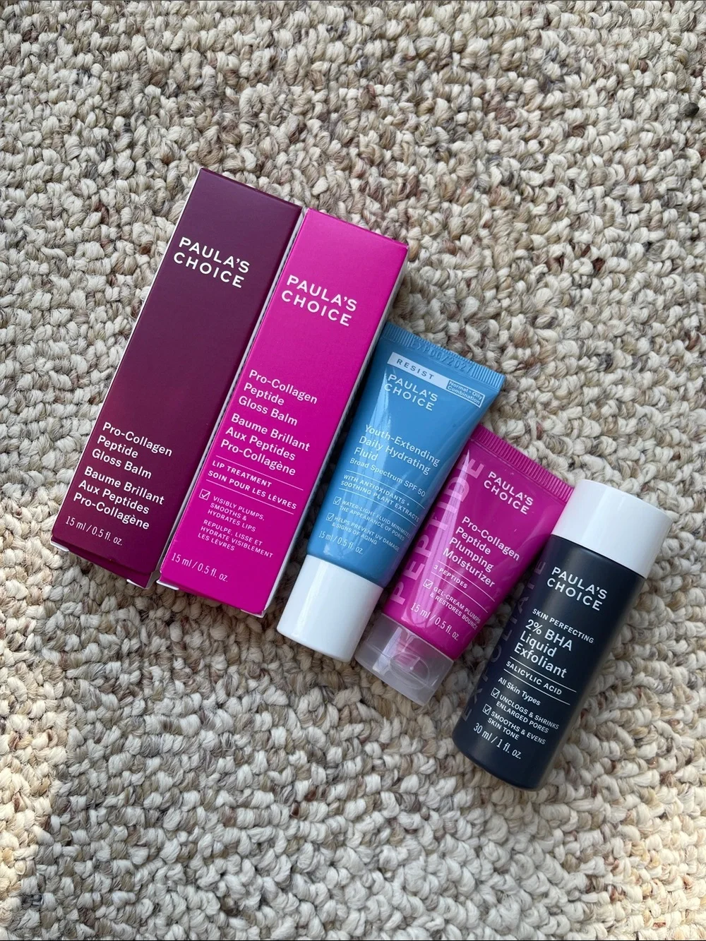 Paula's Choice Skincare Set with Bright Pink and Blue Tubes